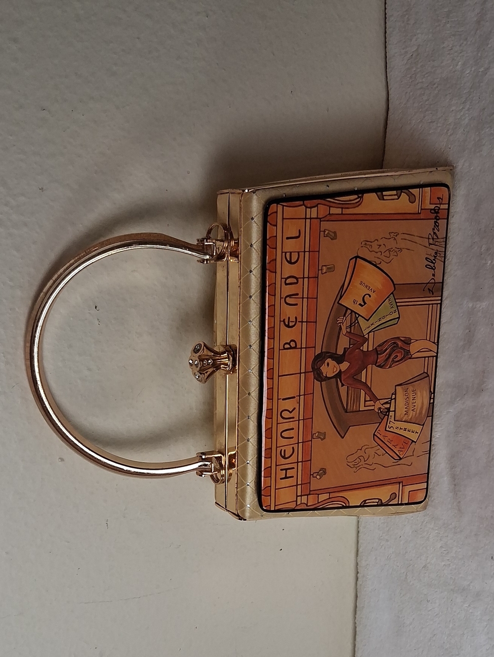 henri bendel Gold Top-Handle Mini Bag with Tan & Orange Graphic